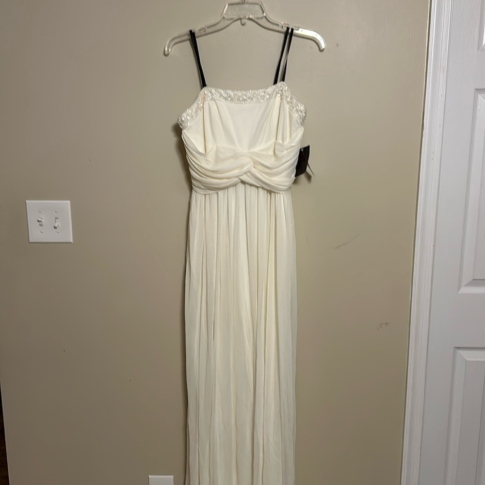 Dusk Collection woman’s dress.  Size 8 by Sheila Yen.  Color Ivory